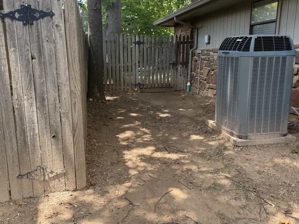 Side yard after brush and leaf cleanup