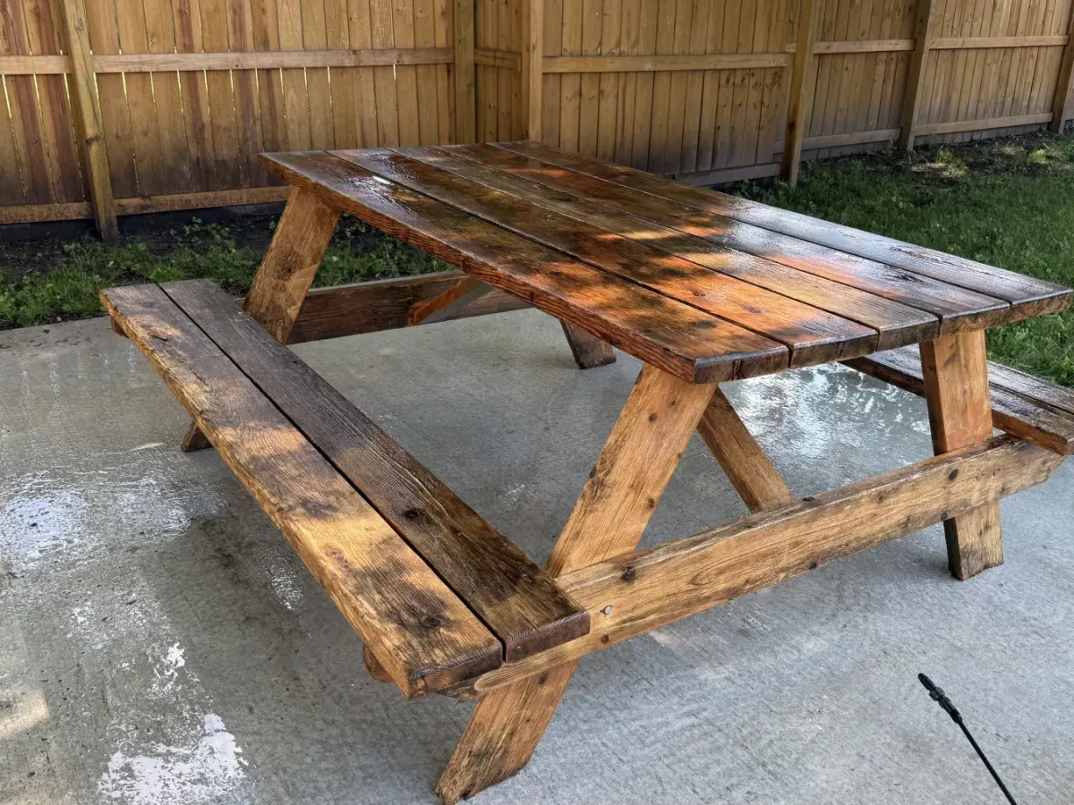 Picnic table and patio after cleanup