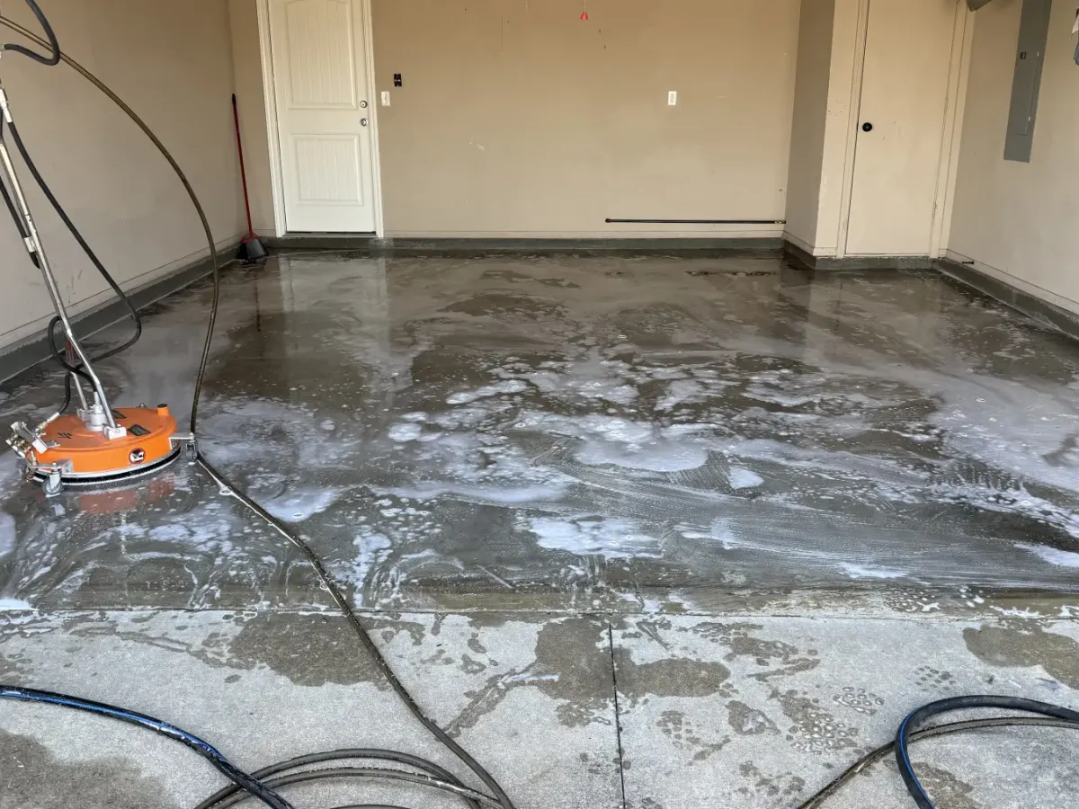 Garage floor before power washing